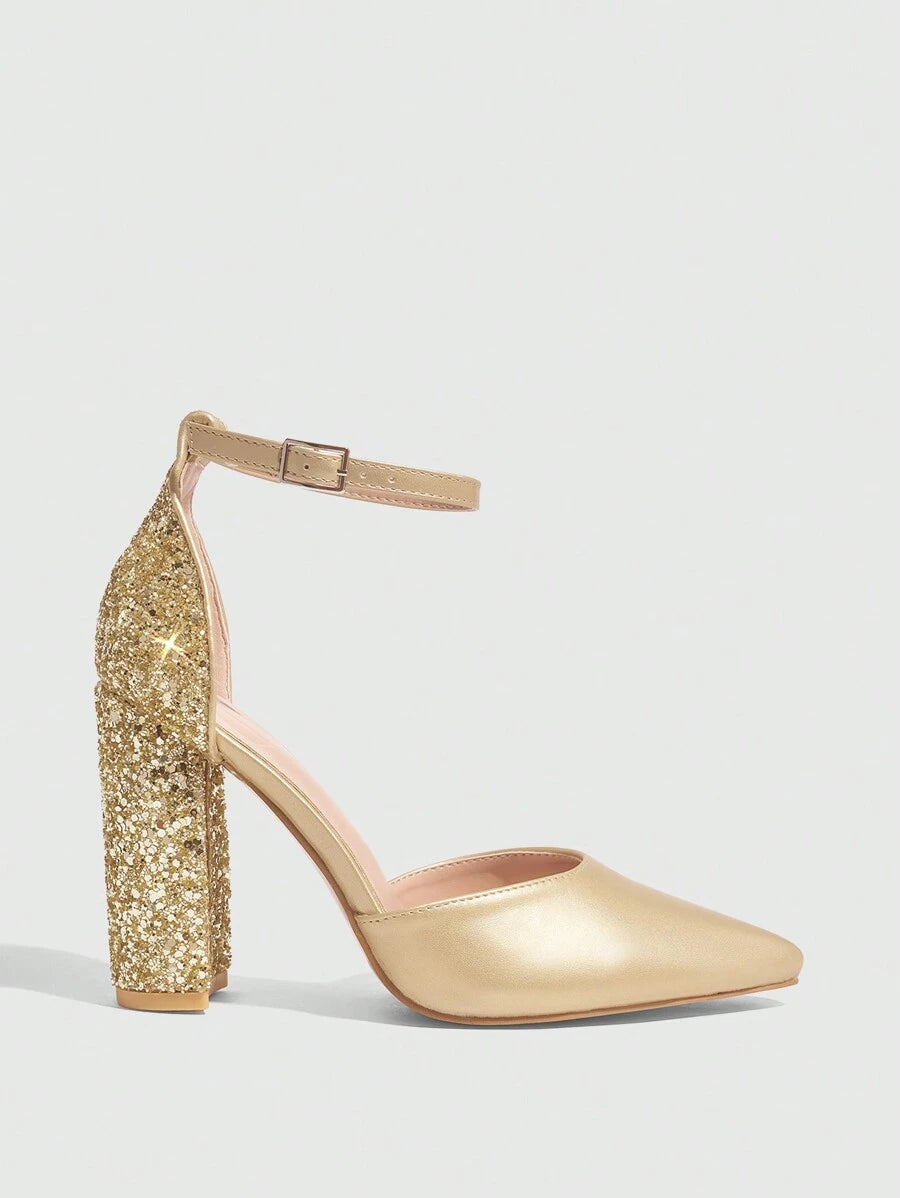 Step into sparkle with these Glamorous Gold Glitter Ankle Strap Pumps! Perfect for adding a dash of dazzling charm, their shimmering gold finish and secure ankle strap keep you comfortable and confident all day or night. Whether it’s a party, date night, or just because, these pumps bring effortless elegance to every step you take. Shine bright and turn heads with a playful touch of glam!