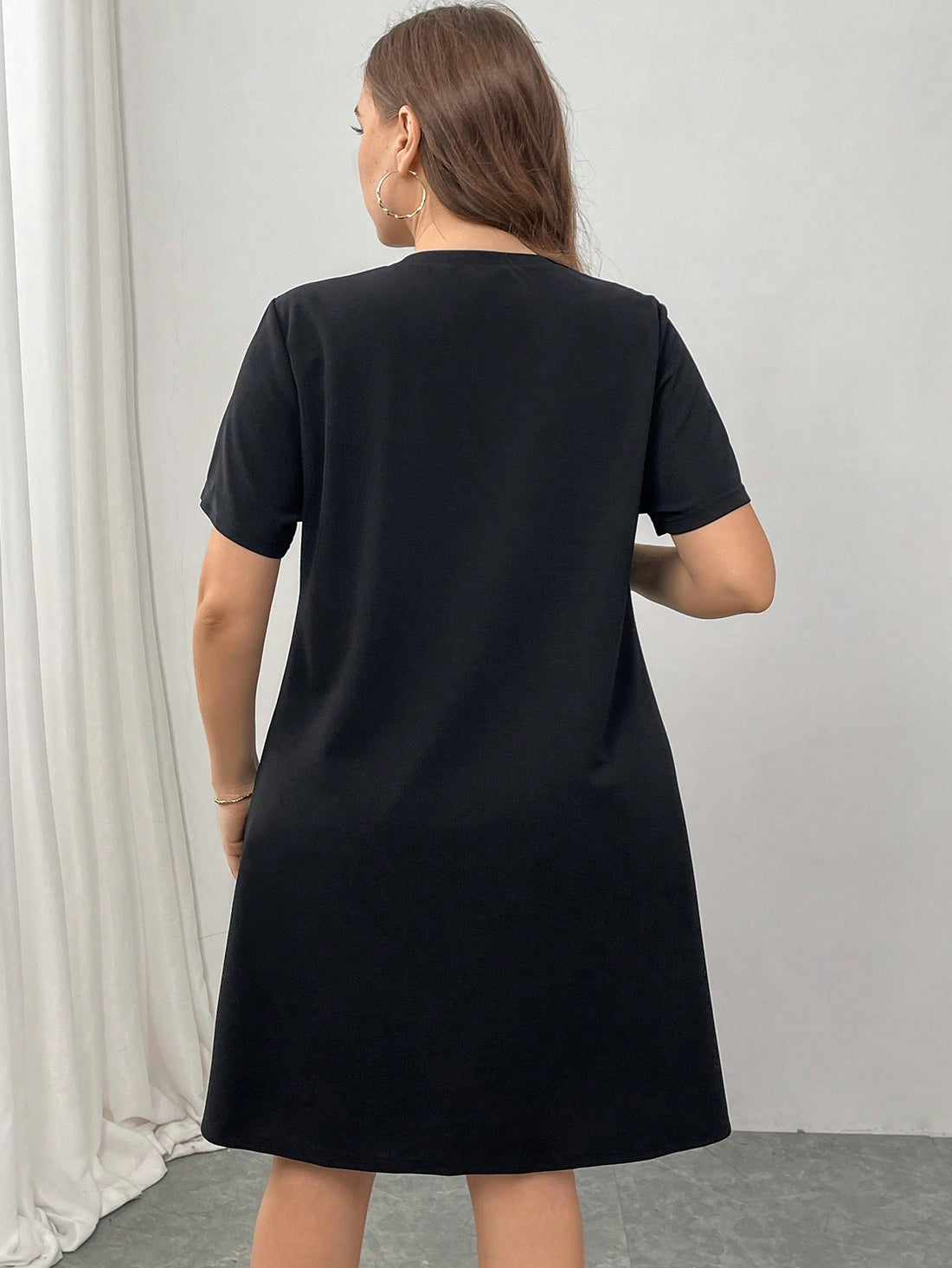 Redefine elegance with this playful and chic short sleeve dress. Featuring a unique bow accent and knitted fabric, this dress is perfect for adding a touch of charm to any look. Comfortable yet stylish, this dress is sure to become a staple in your wardrobe.