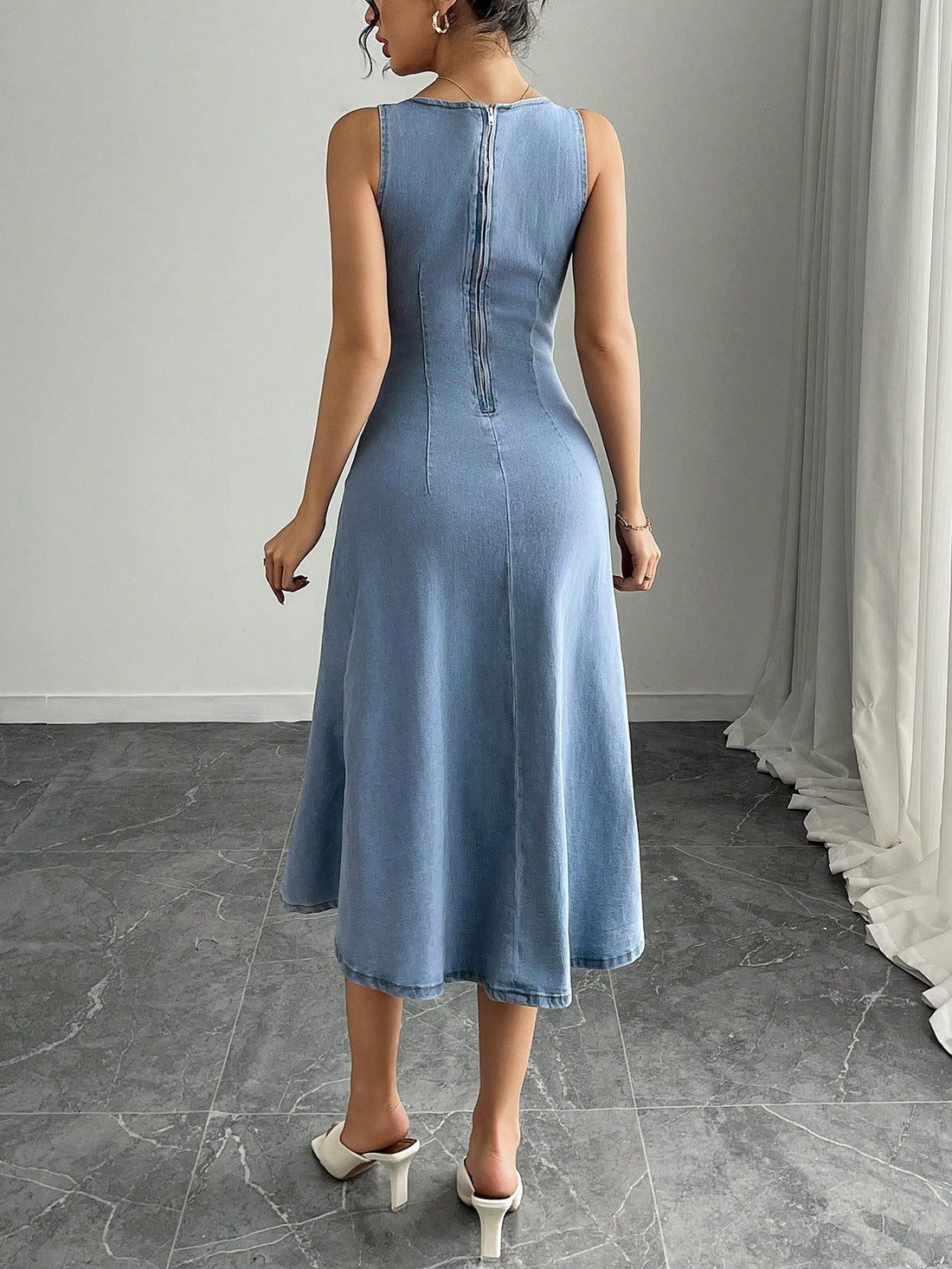 Effortlessly chic and versatile, our Women's V-Neck Sleeveless Gathered Denim Dress is a must-have for any wardrobe! The gathered design and V-neckline flatter your figure, while the sleeveless style keeps you cool and comfortable. Perfect for any occasion, this dress is a timeless and stylish addition to your look!