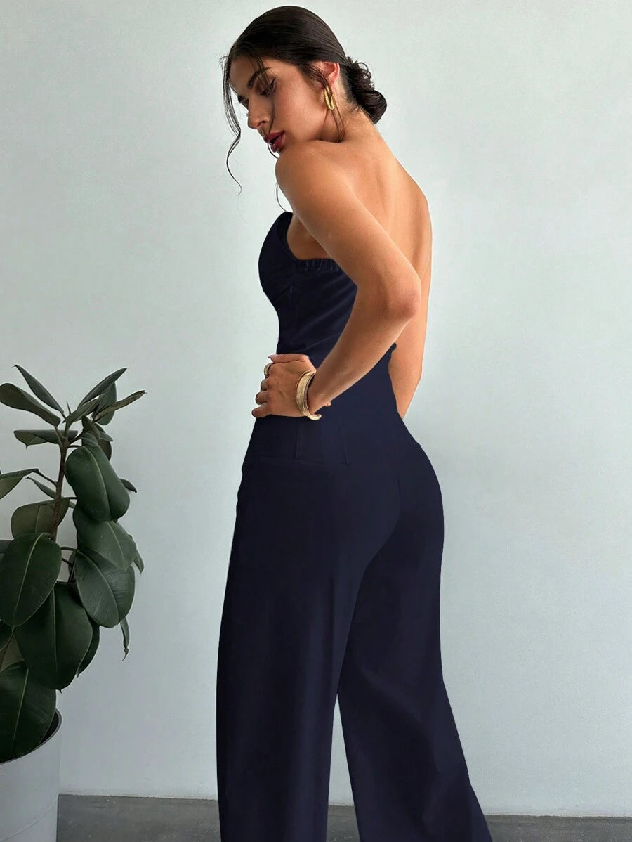 Make a statement in this chic two-piece set that's equal parts bold and effortless. The asymmetrical strapless crop top features a modern silhouette that flatters from every angle, while the high-waisted straight pants provide a sleek, elongating fit. Crafted entirely in crisp white, this pairing works beautifully for nights out, brunch dates, or whenever you want to serve pure sophistication with a playful edge. Mix, match, or wear together—this set is your new go-to for looking put-together without trying