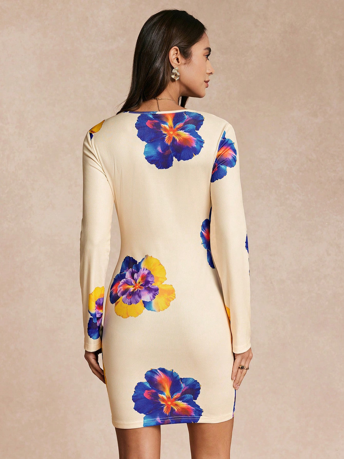 Add some fun and flair to your wardrobe with our Stylish V-Neck Mini Dress! Featuring a trendy allover print and comfortable knit fabric, this dress is perfect for any casual occasion. With its long sleeves and playful v-neck, you'll be sure to turn heads and make a statement. (Warning: may cause sudden urge to twirl!)