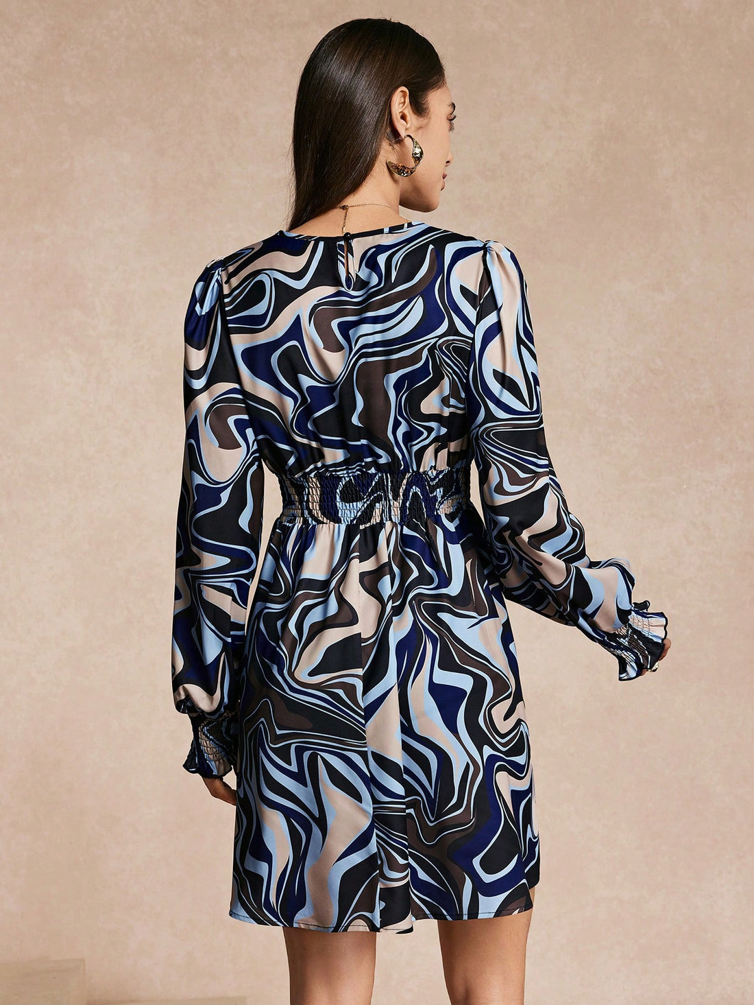 The perfect dress for effortless style! Our Chic Minimalist Long Sleeve Dress features a trendy V-neck and eye-catching all-over print. With its versatile design, you can easily dress it up or down for any occasion. Add a touch of chic to your wardrobe today!