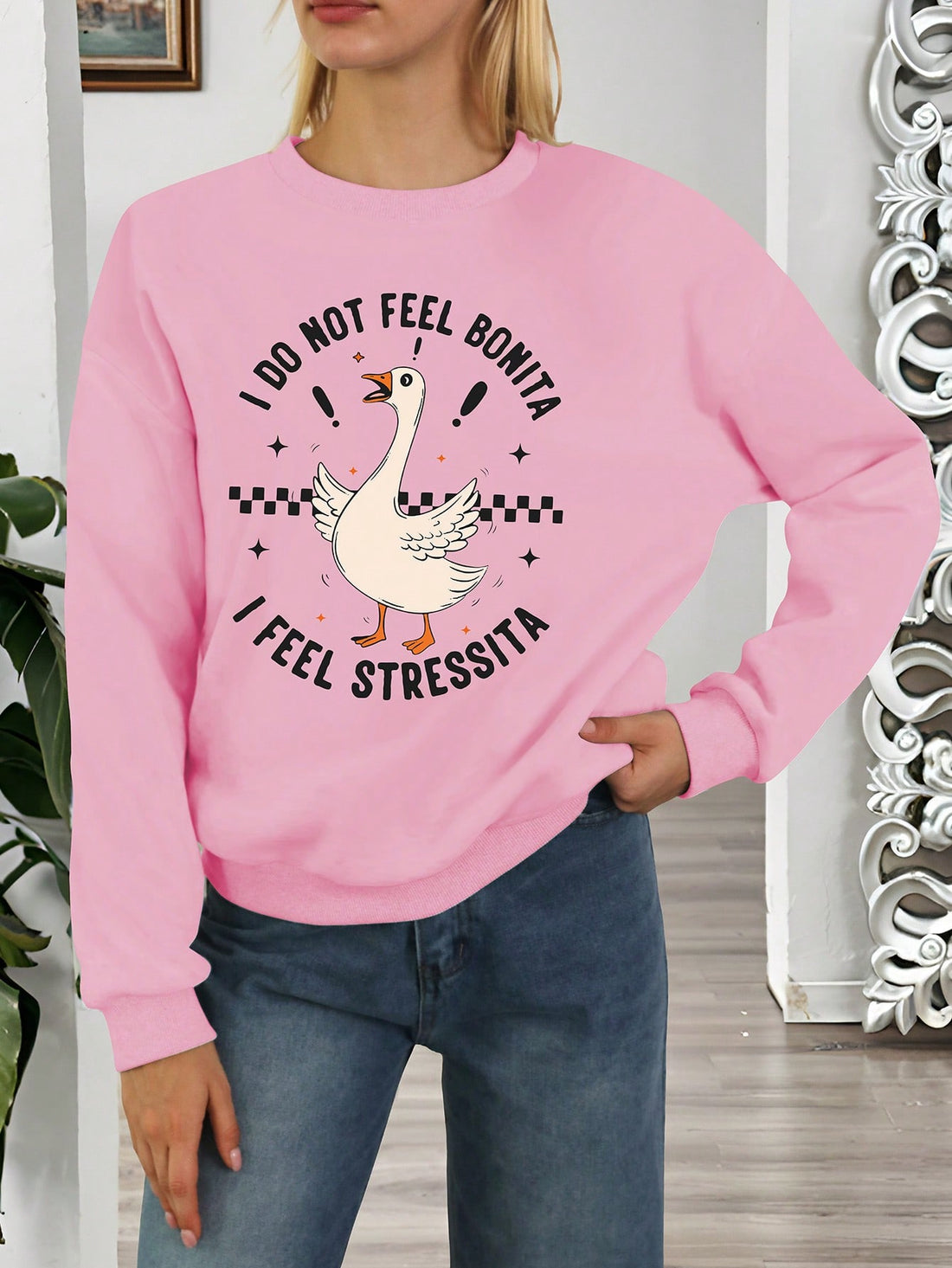 Introducing our Charming Cartoon Duck Graphic Sweatshirt, perfect for the cool autumn and winter season. Get cozy with its casual style and add a touch of charm with the adorable duck graphic. Stand out from the crowd with this unique and playful sweatshirt. Quack, quack!