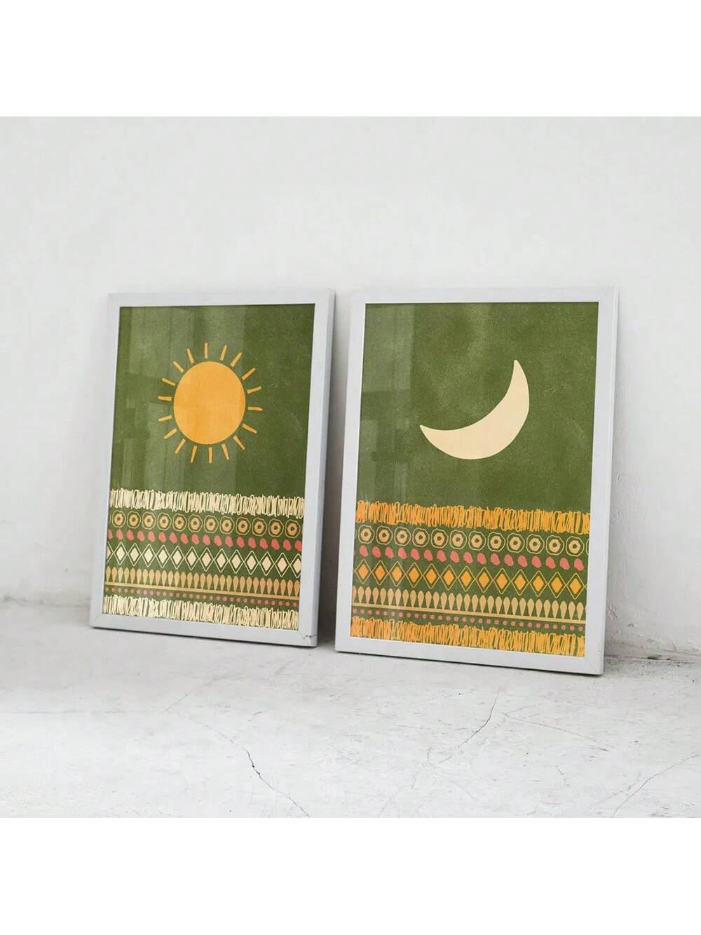 Add some bohemian flair to your home with our Boho Chic posters! This set of two unframed green sun and moon retro posters will bring a touch of whimsy and modern charm to any room. Don't just decorate your walls, express your eclectic style with these unique pieces.