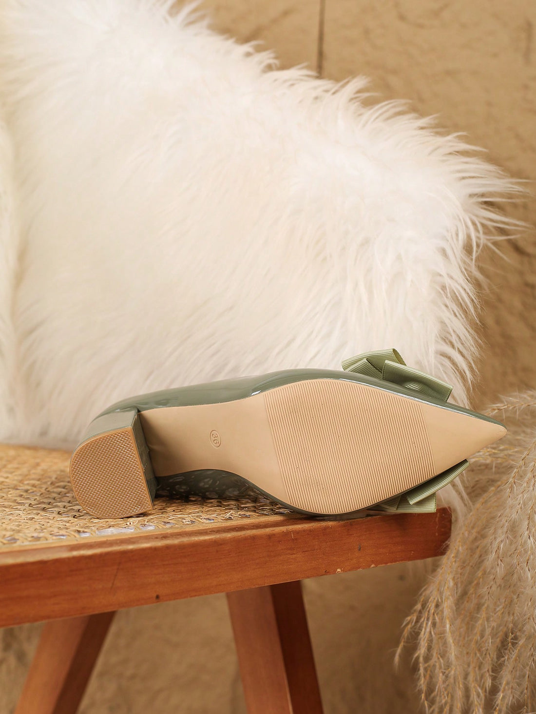 Looking for a stylish and trendy footwear option? These Military Green Bow Decor High Heel Pumps are the perfect pick! The pointed toe and thick heels add a touch of sophistication, while the bow decoration adds a fun and quirky twist. Perfect for any fashion-forward woman wanting to make a statement.