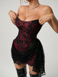Close-up of burgundy floral lace corset bodice and black draped mini skirt overlay
