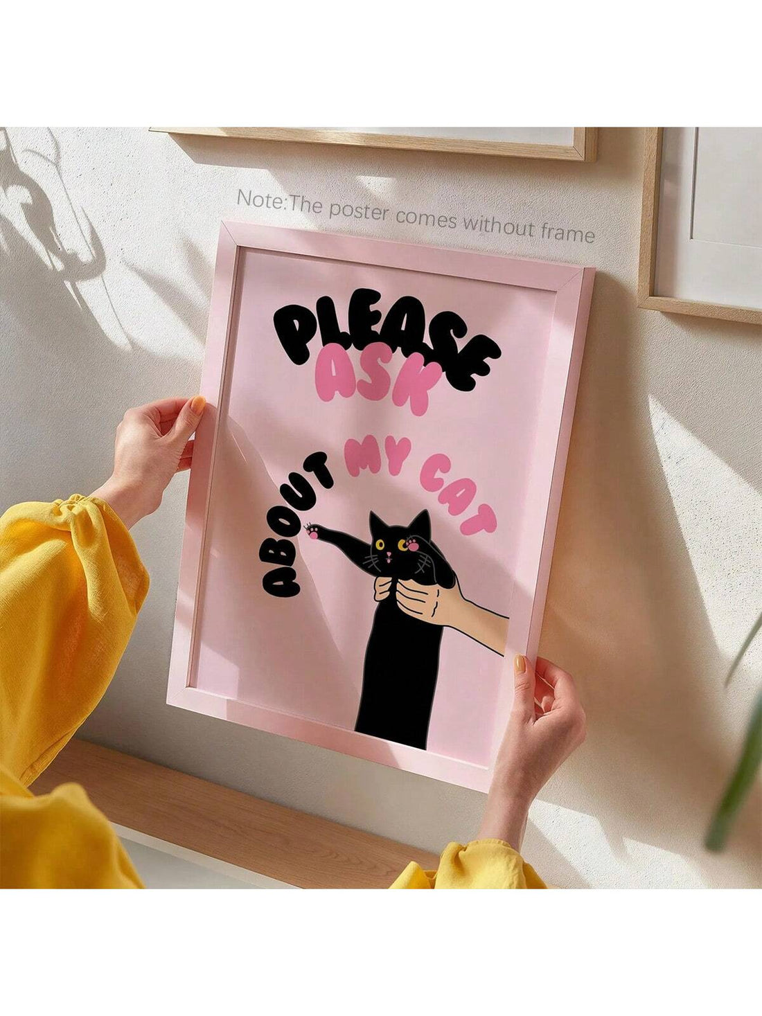 Add a purr-sonal touch to your home decor with our Whimsical Cat Duo Wall Art! Featuring playful pink and black cat prints, it's the purr-fect addition to any room. Meow that's what we call feline-tastic decorating! (Note: Does not come with actual cats.)