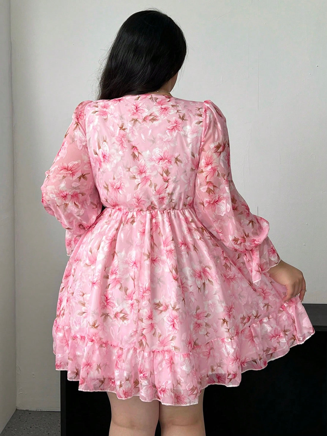 Indulge in Parisian charm with our Romantic French-Inspired Floral Mini Dress. The delicate floral pattern and ruffle hem add a touch of elegance to this dress, perfect for early autumn. Channel your inner French fashionista with this must-have piece.