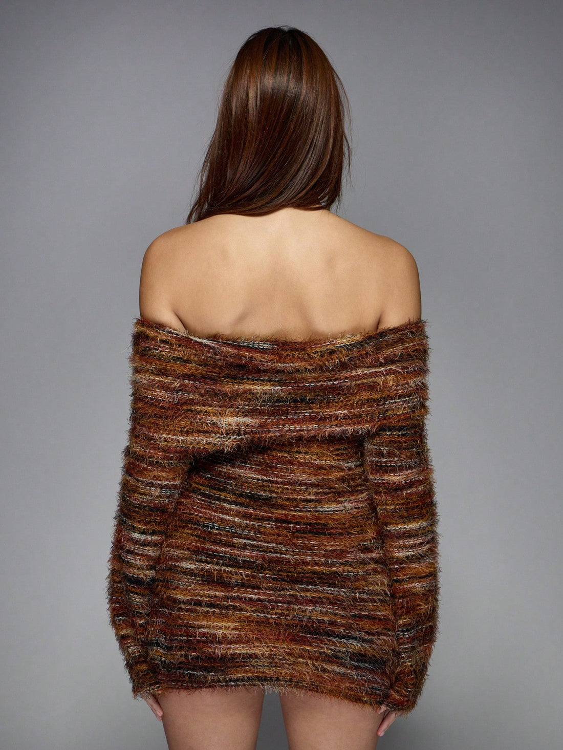 Get ready to turn heads in this Textured Fluffy Knit Bardot Mini Dress! The long flared sleeves and bodycon fit hug your curves in all the right places, while the playful textured knit adds a unique touch. Perfect for a night out, this dress will have you feeling confident and stylish.