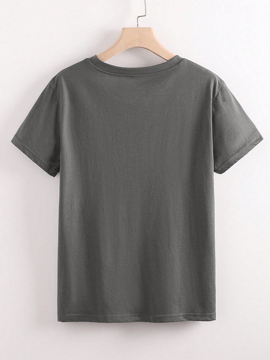Add a pop of personality to your everyday look with our Chic Minimalist Graphic Tee. This casual round neck t-shirt is perfect for any woman looking to elevate her style and and make a statement. The chic design and comfortable fit make this a must-have for every wardrobe.