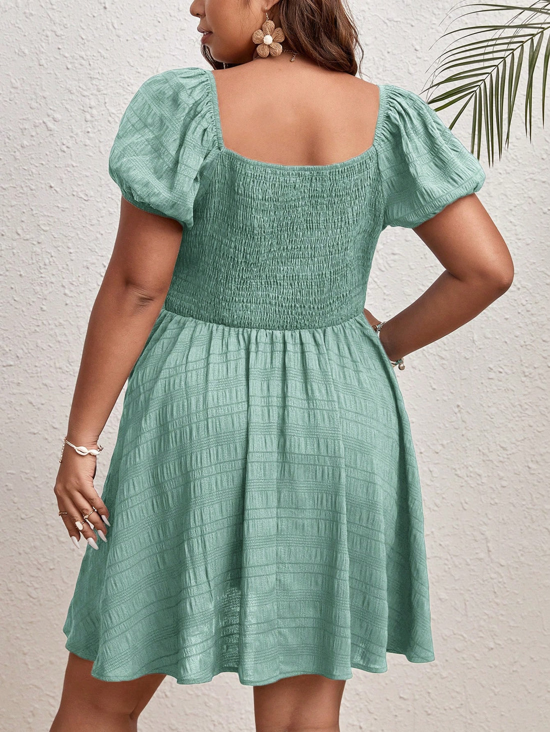 Effortlessly chic on your next vacation with this plus size solid textured dress! The perfect blend of style and comfort, this dress will have you feeling fabulous as you explore. Show off your curves in this must-have vacation dress!