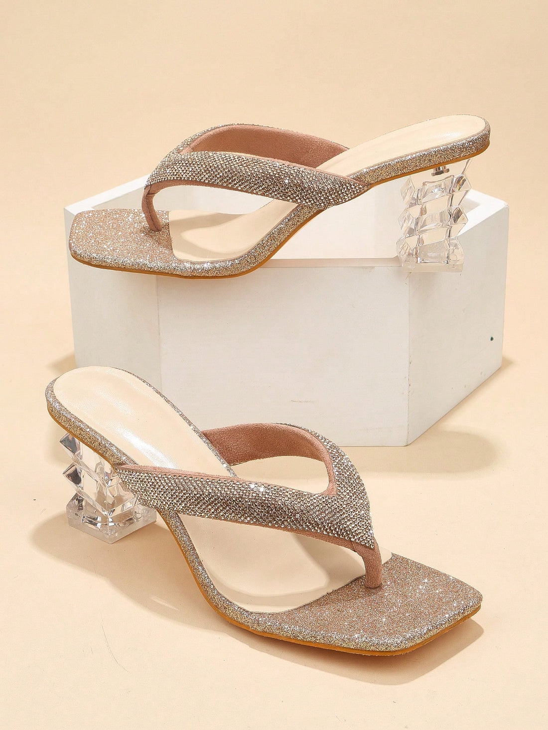 Strut your stuff in these eye-catching crystal strap sandals! The criss-cross transparent design adds a magical glass-slipper vibe, while the glamorous sparkle ensures all eyes are on you. Perfect for turning heads at parties, making grand entrances, or simply feeling like royalty during your everyday adventures. These high heels aren't just shoes—they're your ticket to instant fabulousness!