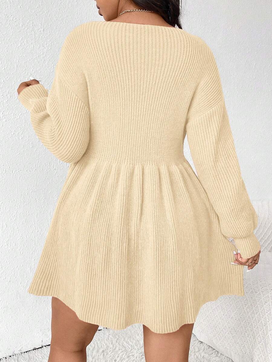 Stay cozy and stylish this winter in our Chic Plus Size V-Neck Sweater Dress. The soft knit hugs your curves beautifully, while charming faux pearl accents add a touch of playful elegance. Perfect for dressing up or down, it’s your go-to for effortless, comfy fashion all season long.