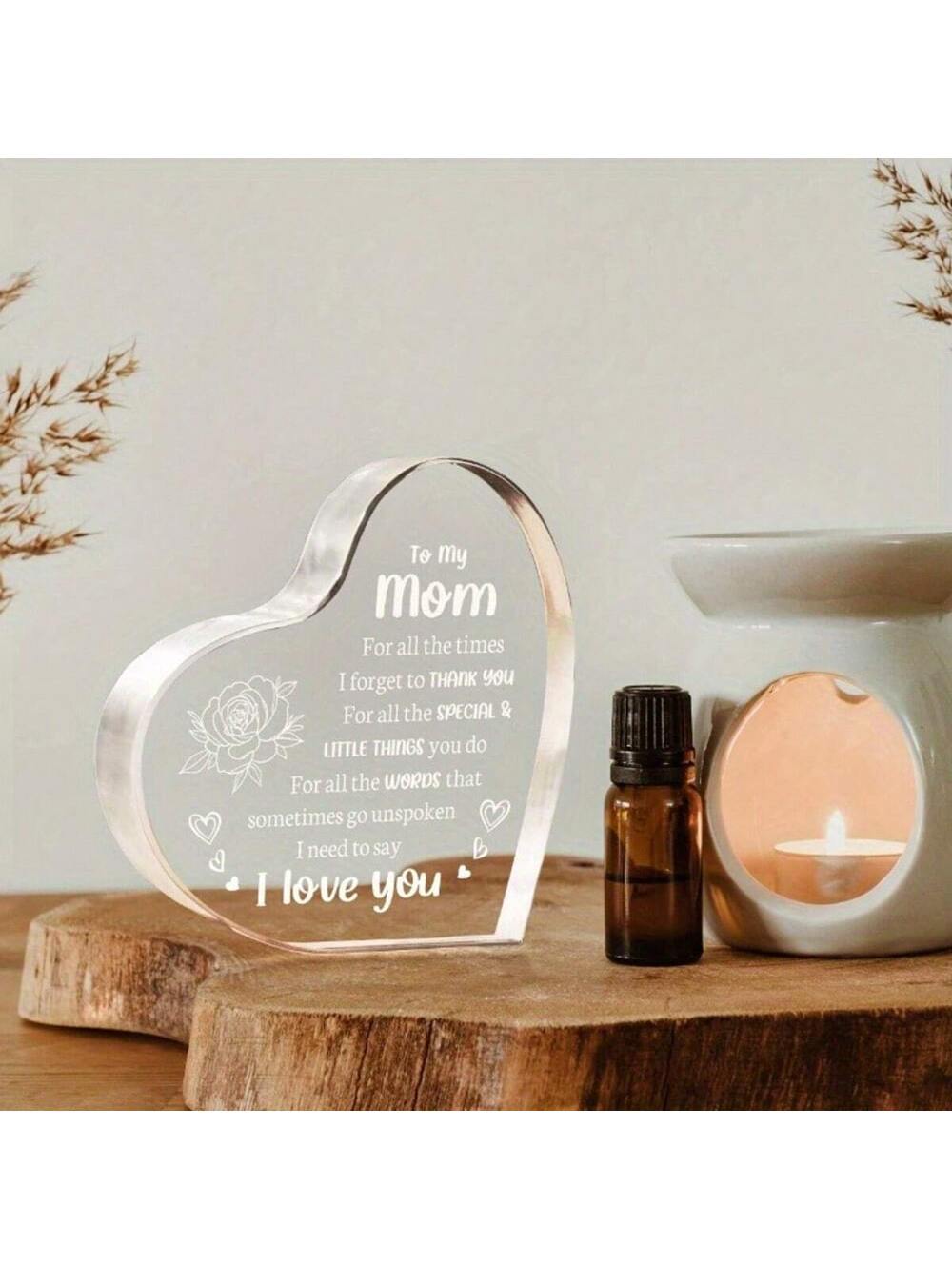 Show your love for Mom with this adorable acrylic souvenir! Perfect for Mother's Day or her birthday, this gift is both sentimental and unique. So why wait? Show your appreciation for everything she does with the "I Love You Mom" acrylic souvenir.