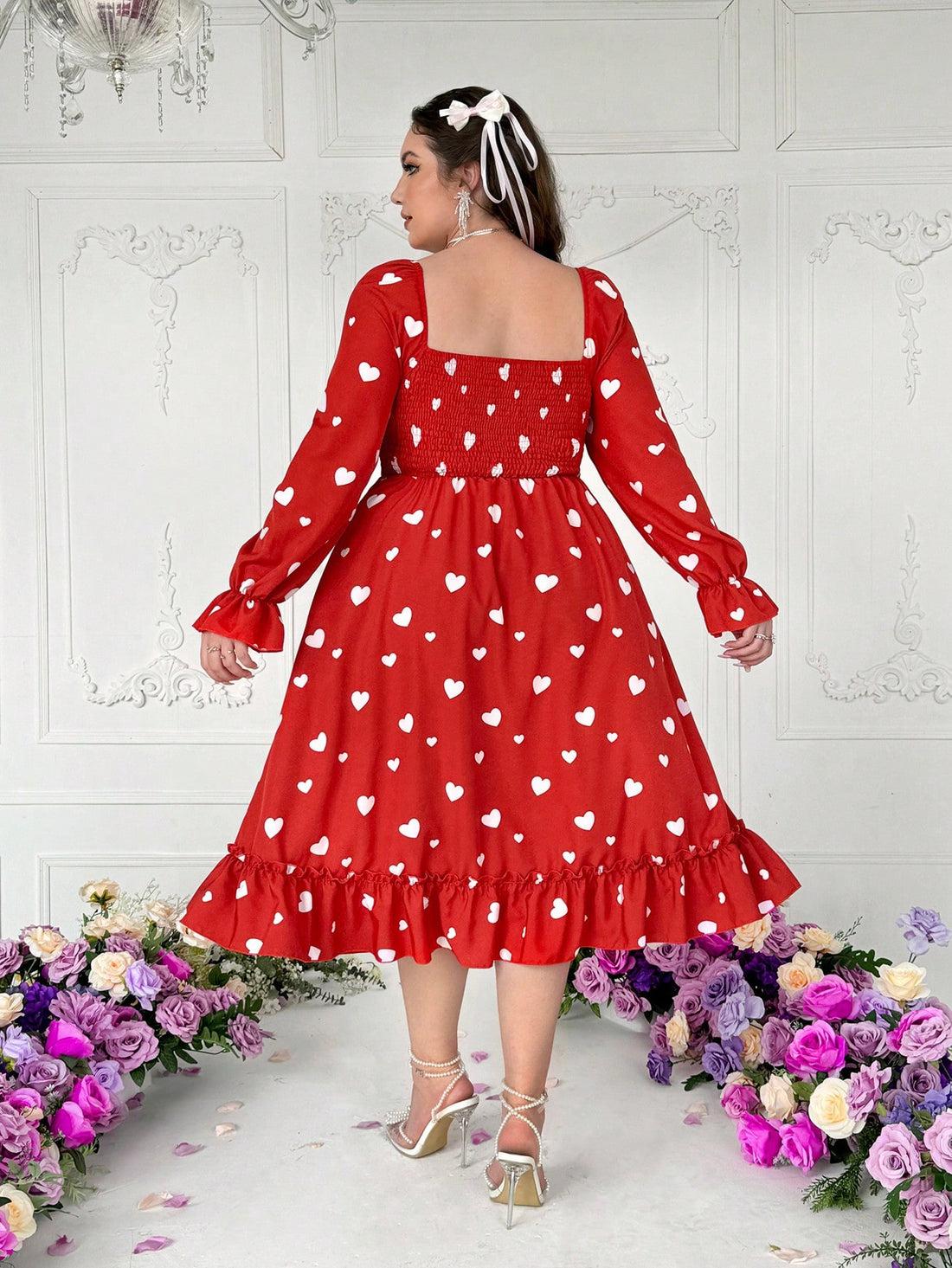 Celebrate love with our Lyrianda Heart Graphic Long Sleeve Dress. This elegant fit & flare dress features a romantic heart graphic and long sleeves, perfect for any Valentine's Day outing. Wear it with confidence and show off your love for fashion and your special someone.