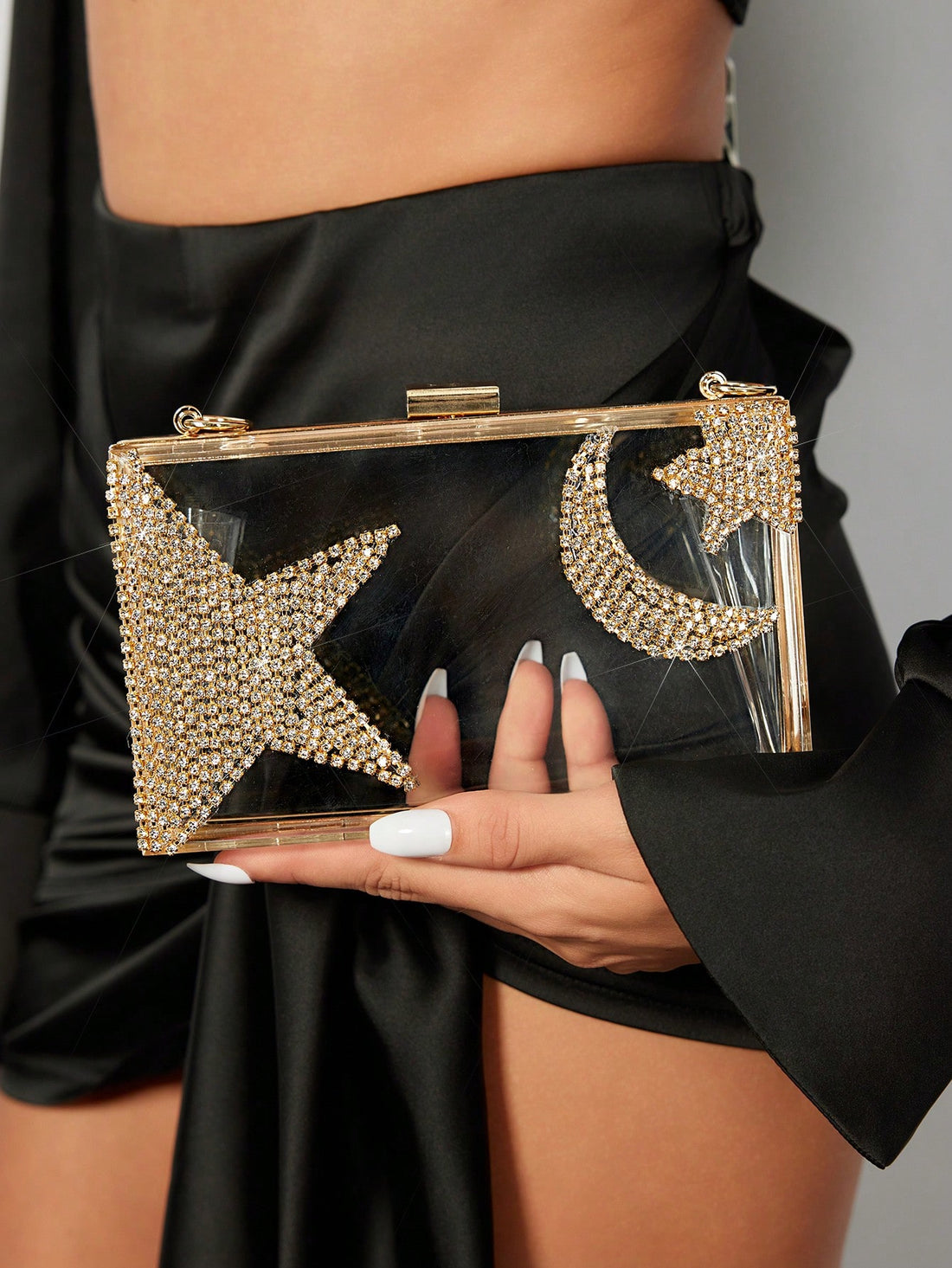 Add a sparkling touch to your essentials with this Chic Acrylic Star Pattern Cosmetic Pouch. Lightweight and stylish, it’s perfect for keeping your makeup and small treasures organized during weddings, prom nights, or Valentine's Day adventures. Its starry design adds a playful charm, making it both a practical and fun accessory for your special moments.