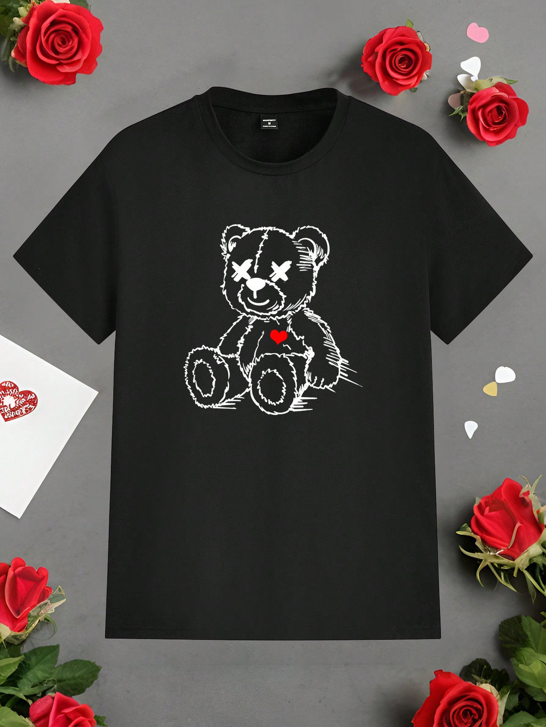 This men's black crew neck t-shirt features a cute Valentine's Day bear and heart graphic, perfect for showing your love in style. Made with high-quality materials, this t-shirt is sure to be a wardrobe favorite. Give your significant other a sweet gift they'll adore!