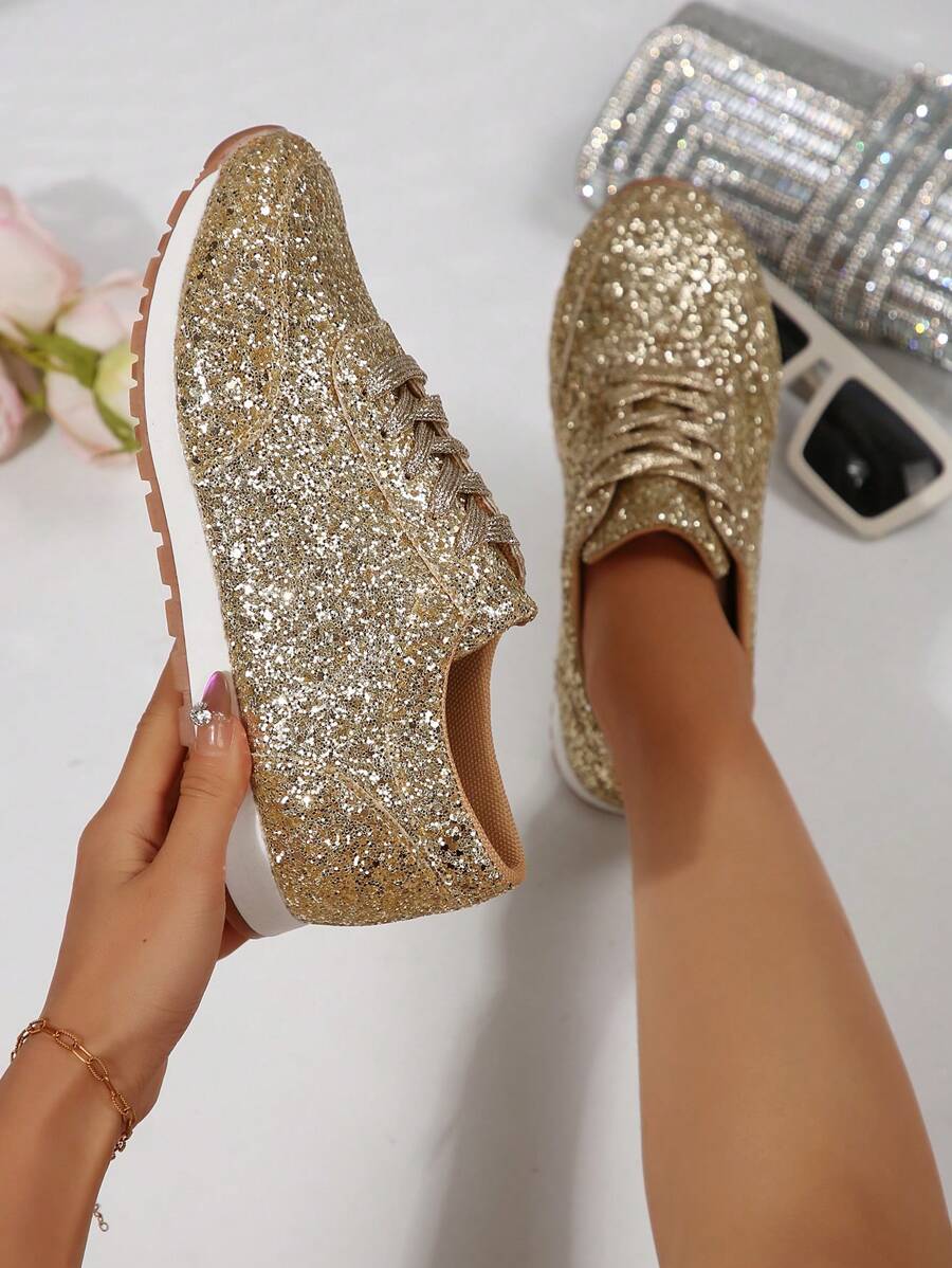 Step into effortless style with these eye-catching plus-size sports flats that blend comfort with contemporary flair. Featuring shimmering sequin-adorned thin straps, they deliver that coveted European-American aesthetic without compromising on wearability. Perfect for casual outings, weekend adventures, or whenever you want to add a touch of sparkle to your everyday look. The thoughtfully designed flat sole keeps you comfortable all day long, while the playful sequin details ensure you'll turn heads wherev
