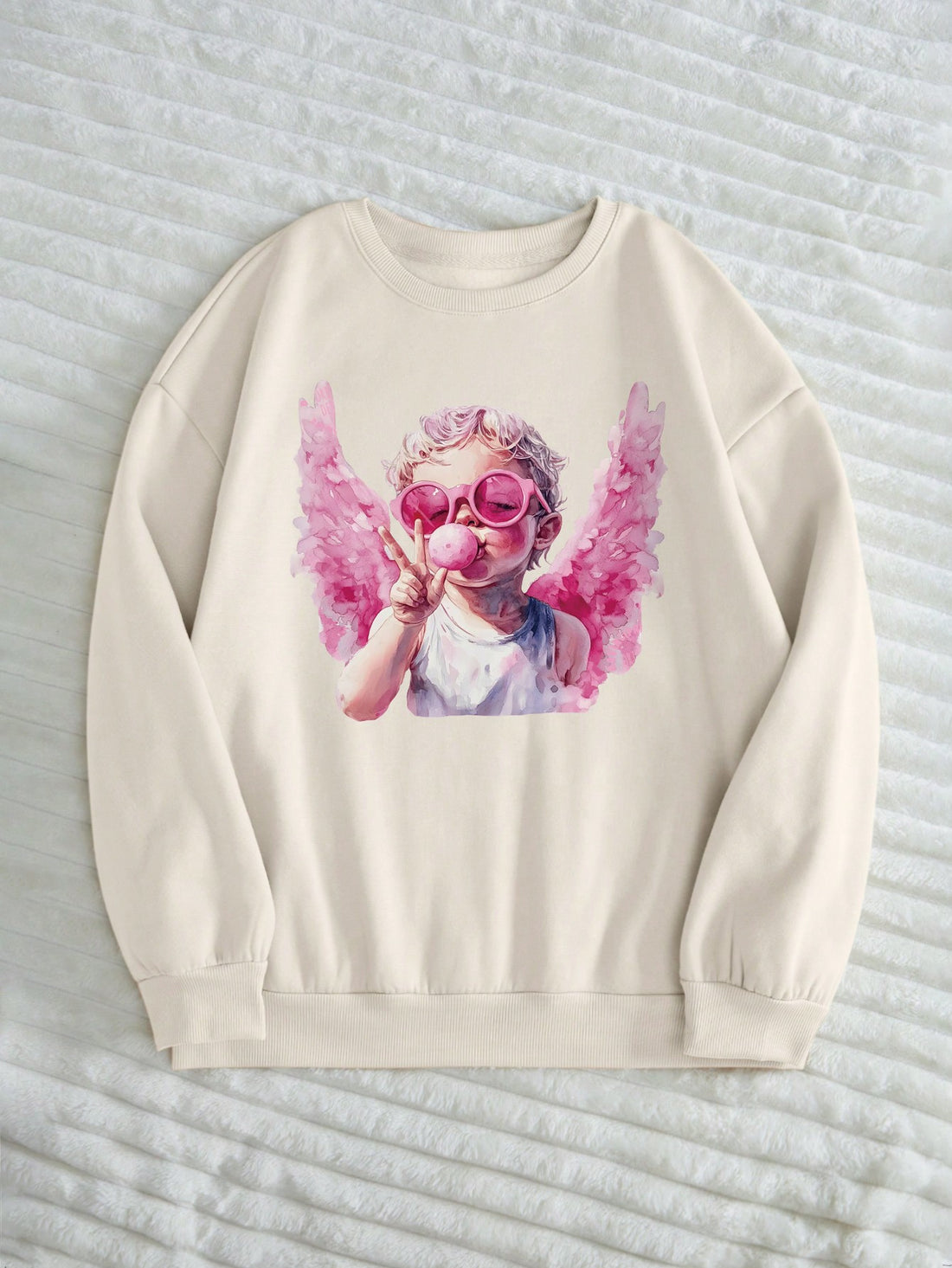 Spread the love with our Cupid Love sweatshirt for Valentine's Day. This cozy sweatshirt, adorned with a cute cupid design, is perfect for love birds looking to stay warm and stylish. It's the perfect gift for your significant other or yourself (because self-love is important too)!