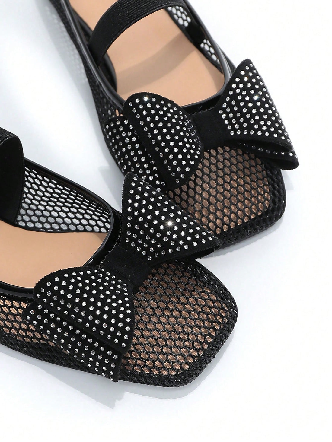 Get ready to breeze through summer with these chic flats. Adorned with rhinestone bowknots, they offer ultimate comfort without sacrificing style. Perfect for any occasion, these flats will keep you feeling light and sparkling (just like the rhinestones)!