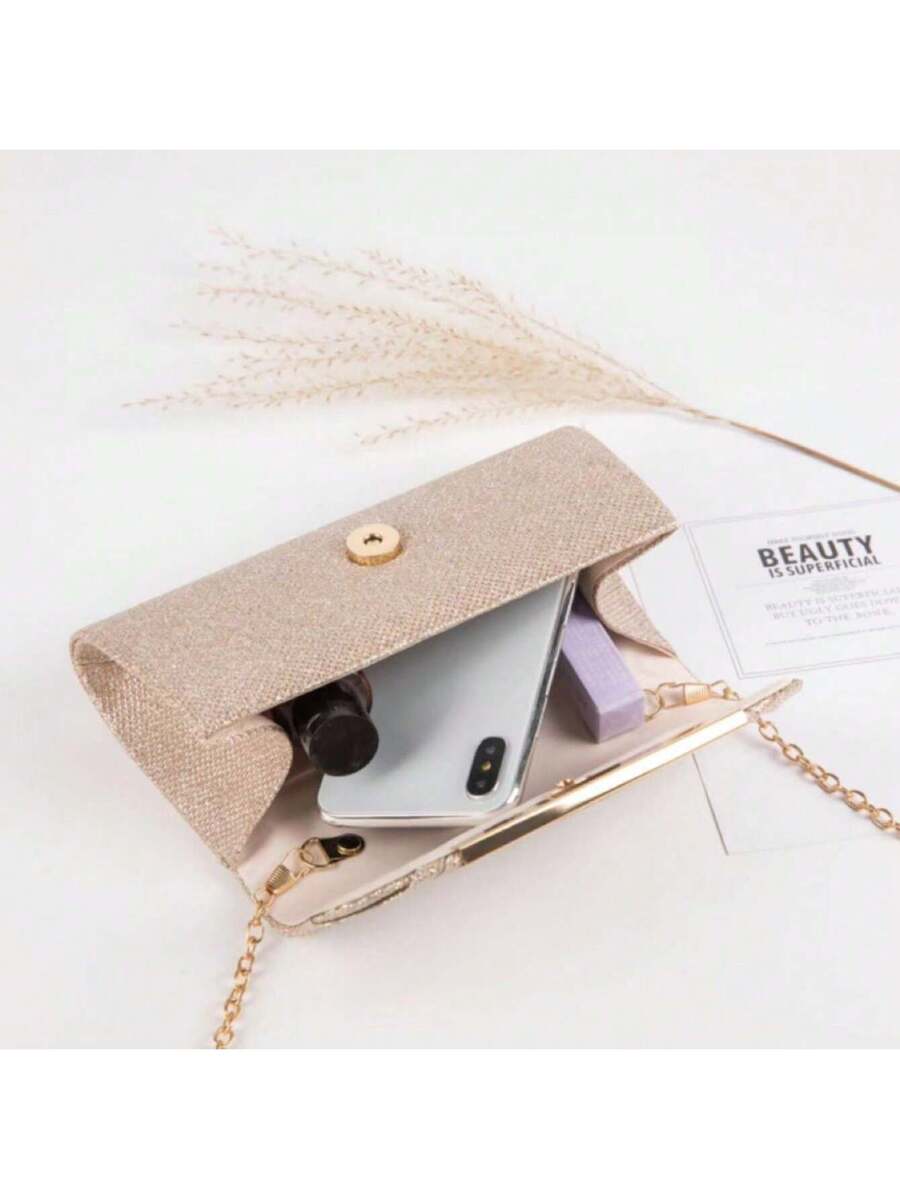 Add a dash of sparkle to your day or night with this Elegant Shimmering Clutch Bag. Small but mighty, it holds your essentials while the chic chain strap lets you go hands-free. Perfect for brightening up daily errands or adding glam to evening outings, this clutch is your new style sidekick.