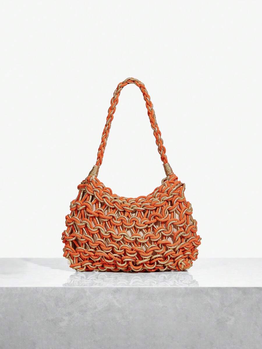 Brighten your beach days with this playful orange and gold crochet hobo bag. Lightweight and spacious, it’s perfect for carrying your sun essentials while adding a splash of vibrant style to your look. Its unique crochet design mixes casual charm with elegant shimmer, making it your go-to accessory for seaside adventures and sunny strolls.