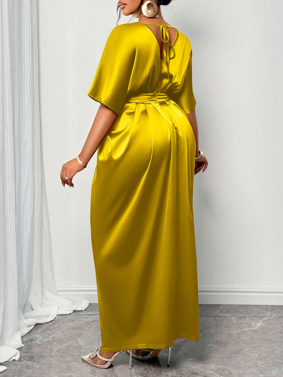 Introducing the perfect dress for all your winter and special occasion needs - the Elegant Maweii Plus Size Cocktail Dress! With its versatile design, it effortlessly transitions from day to night. Stay stylish and comfortable no matter the occasion. Plus size options available. Cheers (to looking fabulous)!