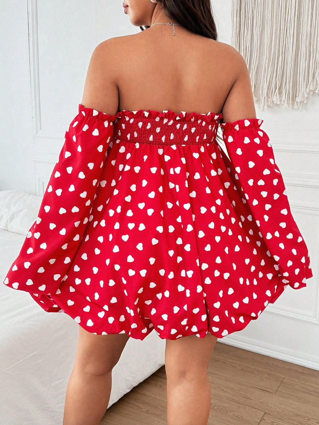 Celebrate the day of love in style with our Plus Size Valentine's Day Midi Dress! Featuring a charming heart print and playful ruffle hem, this dress is sure to make you stand out. With its comfortable fit and flattering silhouette, you'll feel confident and beautiful all day long. Show off your love for fashion and fun with this must-have dress.