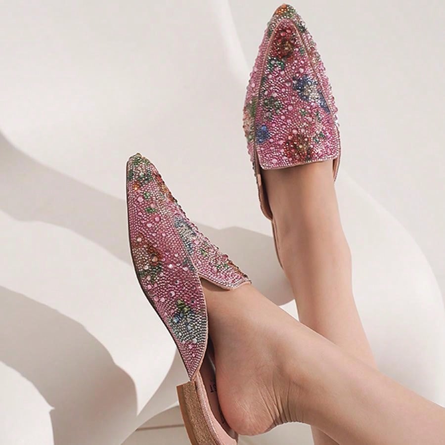 Add a touch of sparkle to your shoe collection with our Slip-On Mules. Made for the chic and fashion-forward woman, these pointed toe backless loafers feature sparkling rhinestones. Slip them on for effortless style and a touch of whimsy. (P.S. - They're also perfect for dancing the night away!)