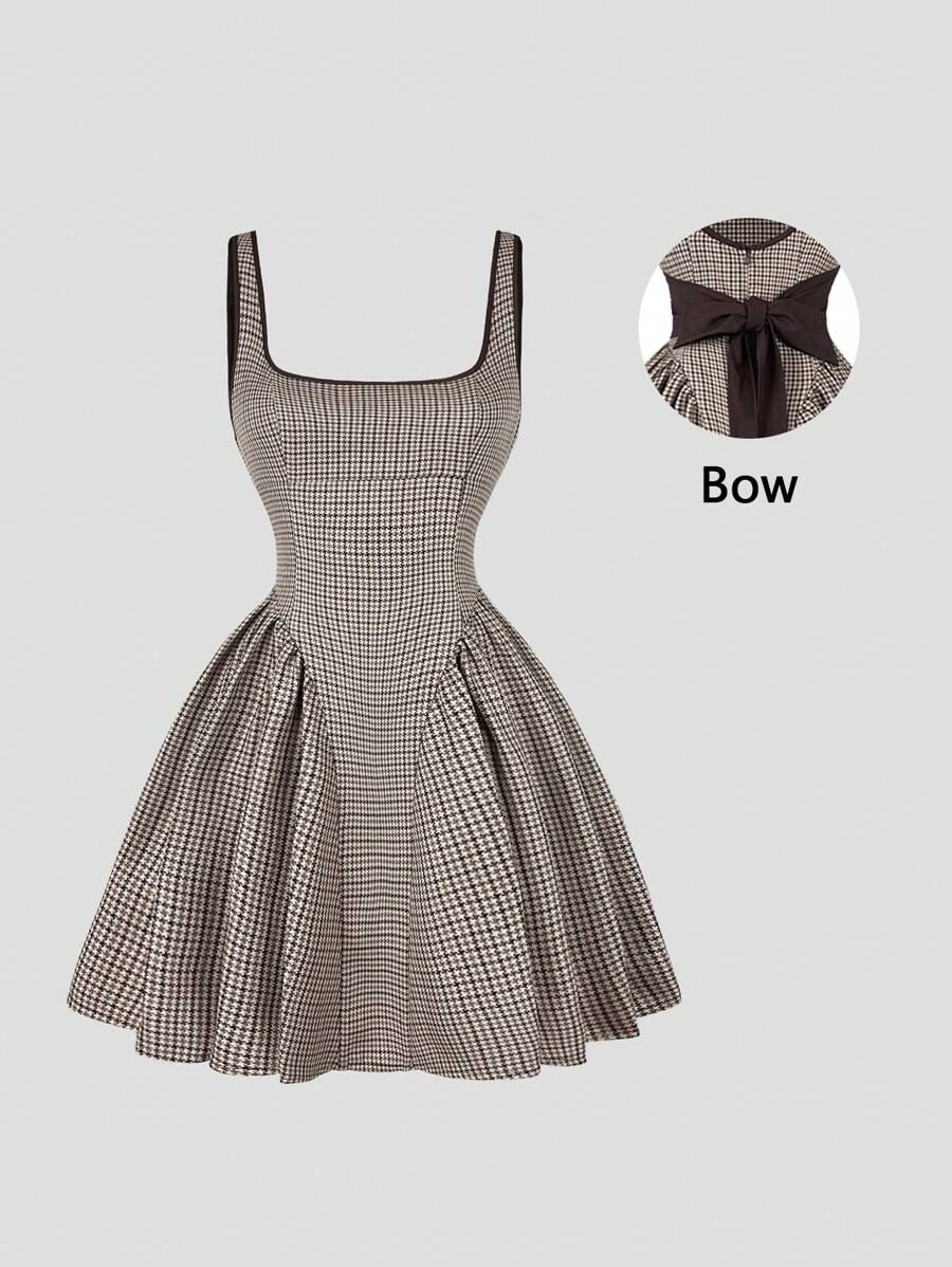 Step out in style with this Retro French Plaid Bow Tie-Up Camisole Dress. Featuring a flattering cinched waist and a flirty back cutout, it’s perfect for turning heads. The charming plaid pattern adds a vintage vibe, while the bow tie-up detail brings a playful touch. Ideal for sunny days or casual nights out, this dress combines comfort and sass effortlessly.