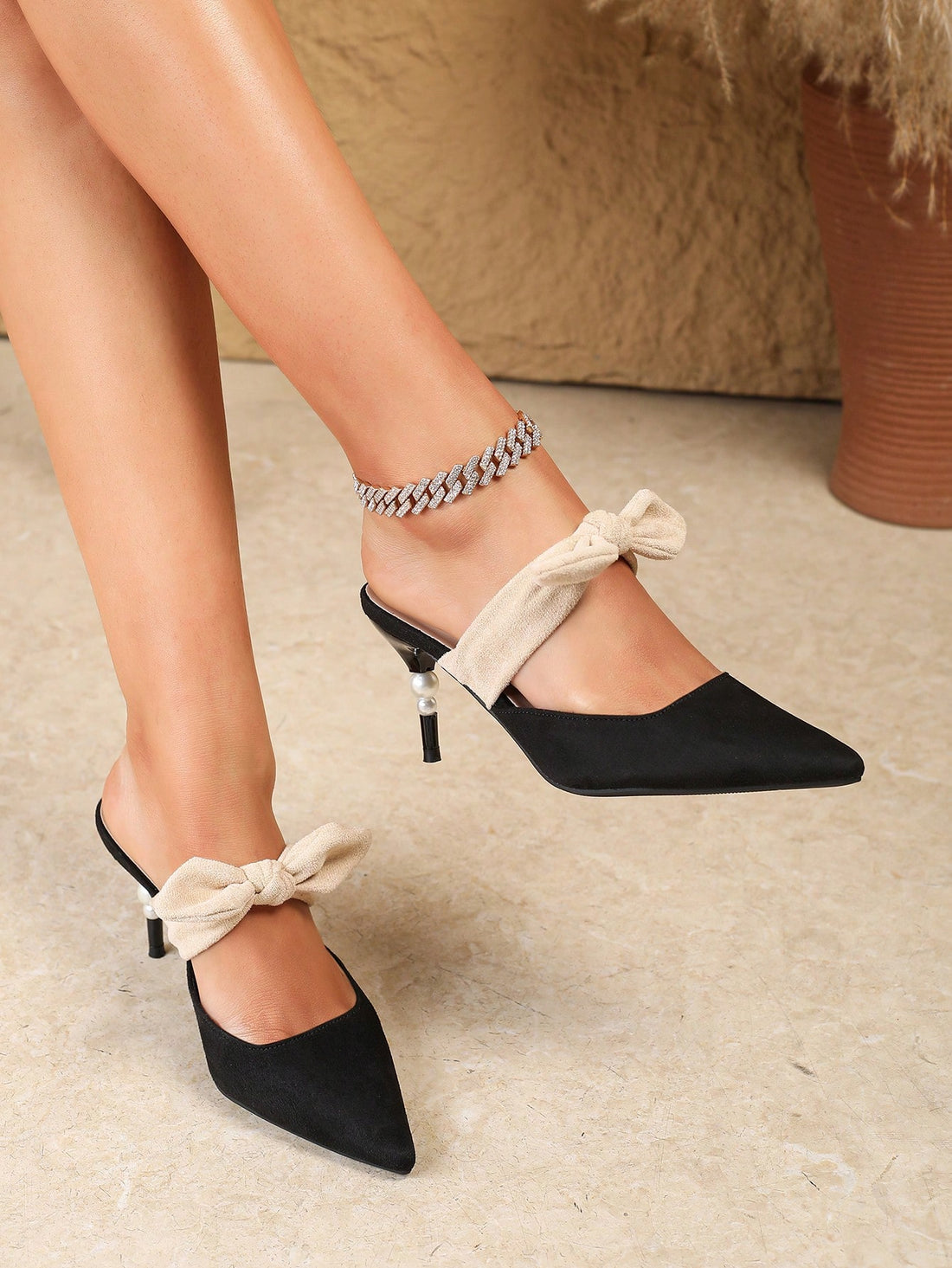 Step into style with our Chic Spring Elegance mules! These sleek black slip-ons feature a pointed toe and mid-heel for a sophisticated touch. The butterfly hollow design adds a whimsical touch to your ensemble. Elevate your spring look with these trendy and elegant mules. (You'll be the talk of the town!)