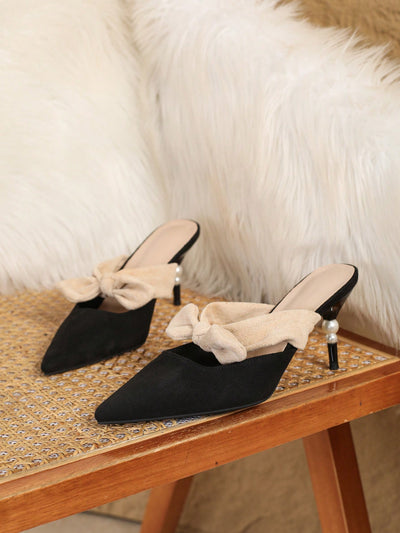 Chic Spring Elegance: Black Pointed Toe Mid-Heel Slip-On Mules with Butterfly Hollow Design