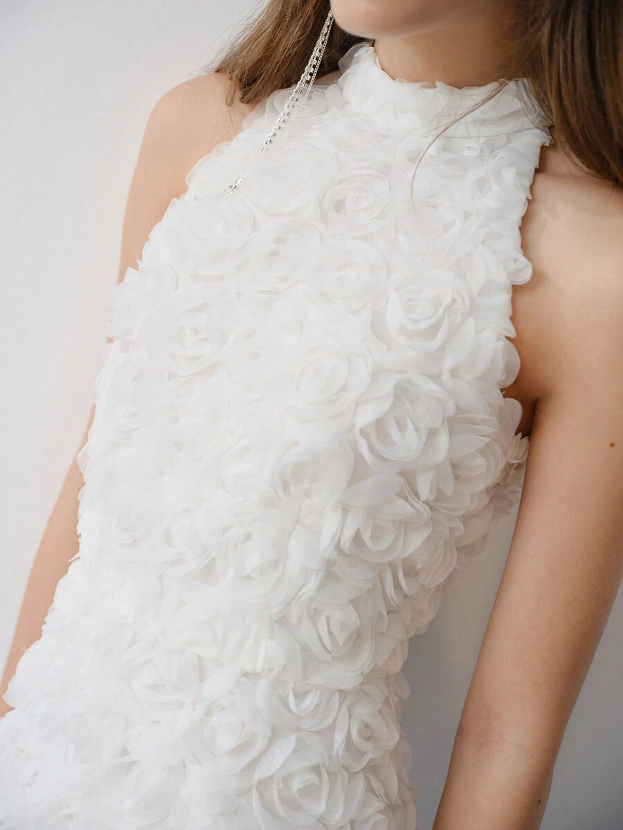 Turn heads this Valentine’s Day with our Chic Mesh Halterneck Dress, adorned with delicate floral appliqués that add a touch of romance. The airy mesh fabric keeps you feeling light and flirty, while the halterneck silhouette highlights your shoulders for an effortlessly elegant look. Perfect for a night full of love and charm, this dress brings out your playful side with every twirl.