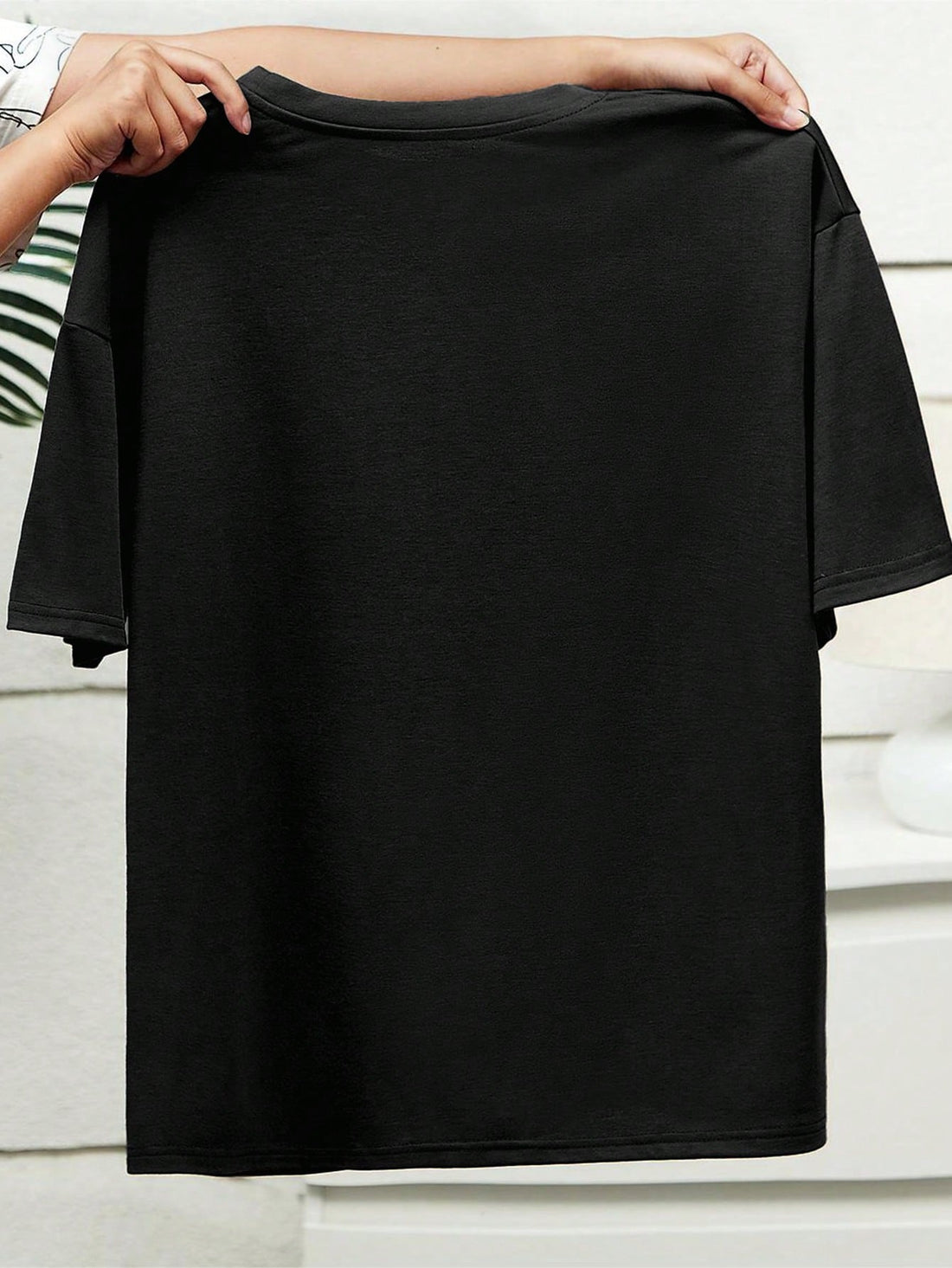 Unleash your inner feline with this trendy plus size cat graphic tee! Featuring a skull cat design, this casual tee is perfect for cat lovers and fashionistas alike. Made with high-quality materials, it's both stylish and comfortable. Get ready to rock your casual looks with this purrfect graphic tee.