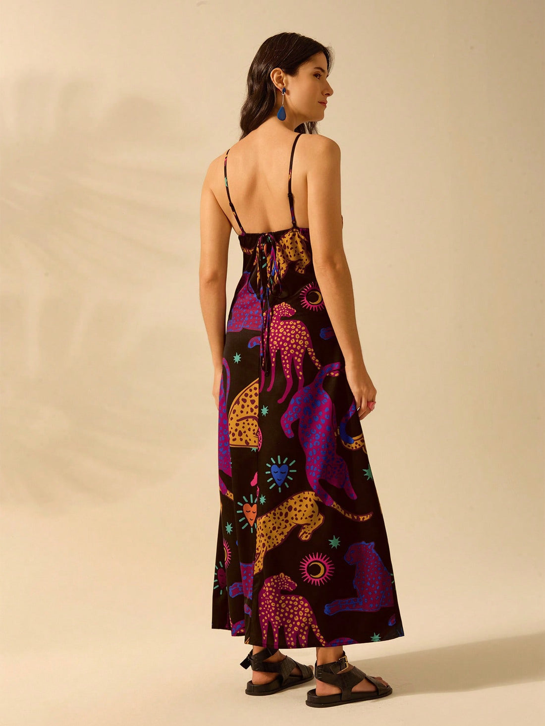 Get ready to stand out in the crowd with our Colorful Boho Tropical Animal Print Sleeveless Dress! Perfect for Summer Vacations, this dress boasts a unique and playful print that will add a fun touch to your wardrobe. Let your adventurous side shine through with this must-have dress.