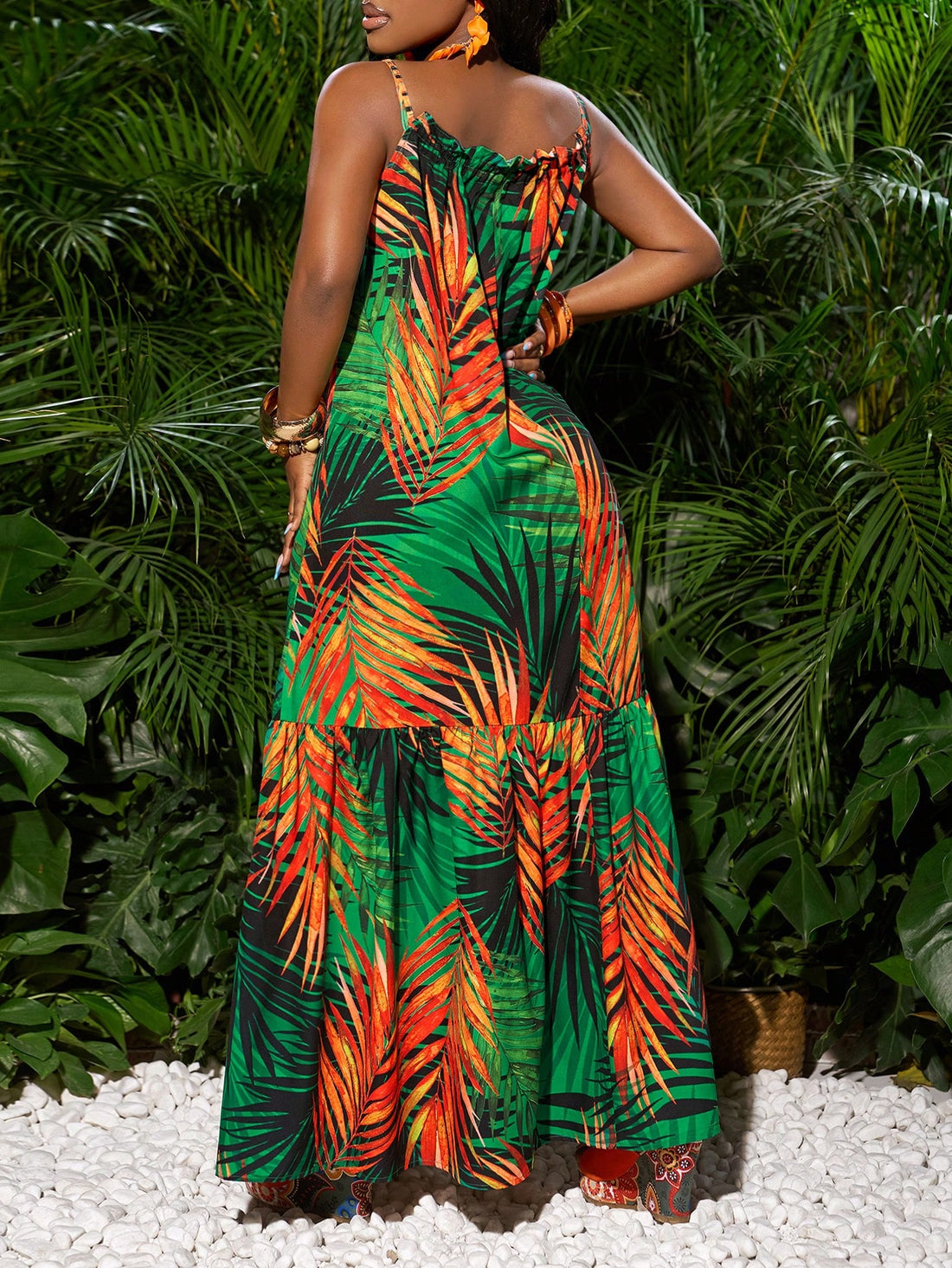 Effortlessly embrace summer style with our Chic Green Plant Print A-Hem Maxi Dress. The lively green color and unique plant print make for a playful and stylish look. The A-hem design adds a touch of whimsy to this maxi dress. Perfect for any occasion, this dress will have you feeling chic and carefree all season long.