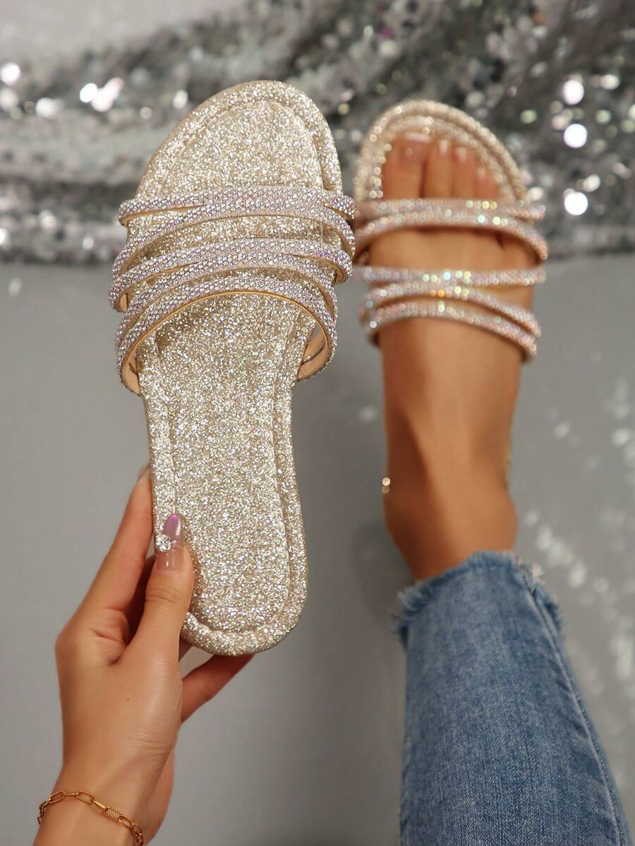 Gold glitter rhinestone slide sandals with sparkly footbed and multi straps