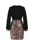 A long-sleeve mini dress shown from the back, featuring a solid black upper back and sleeves with a vibrant, multicolored sequined skirt.