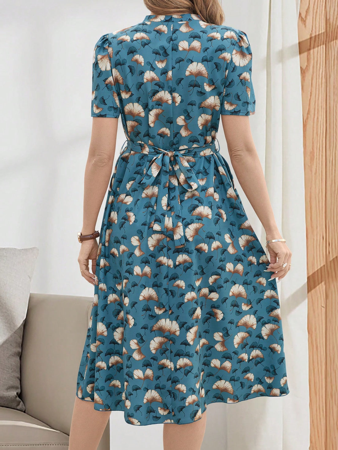 Elevate your style with Emery Rose's Elegant V-Neck Tie-Up Casual Mid-Length Dress. The chic v-neckline and playful tie-up detail will have you turning heads wherever you go. Perfect for any occasion, this dress offers both style and comfort. Be the envy of every room you enter!