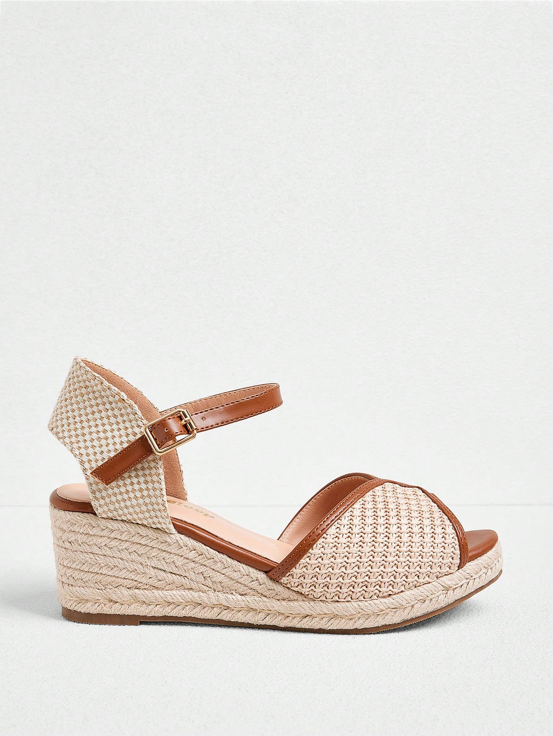 Step into style and comfort with these chic solid color straw wedge sandals! Featuring a playful ankle strap and a versatile thick sole, they’re perfect for adding a fun twist to any outfit all year round. Whether you’re strolling through summer streets or brightening up a cozy fall day, these wedges bring a breezy, fashionable vibe to every season.