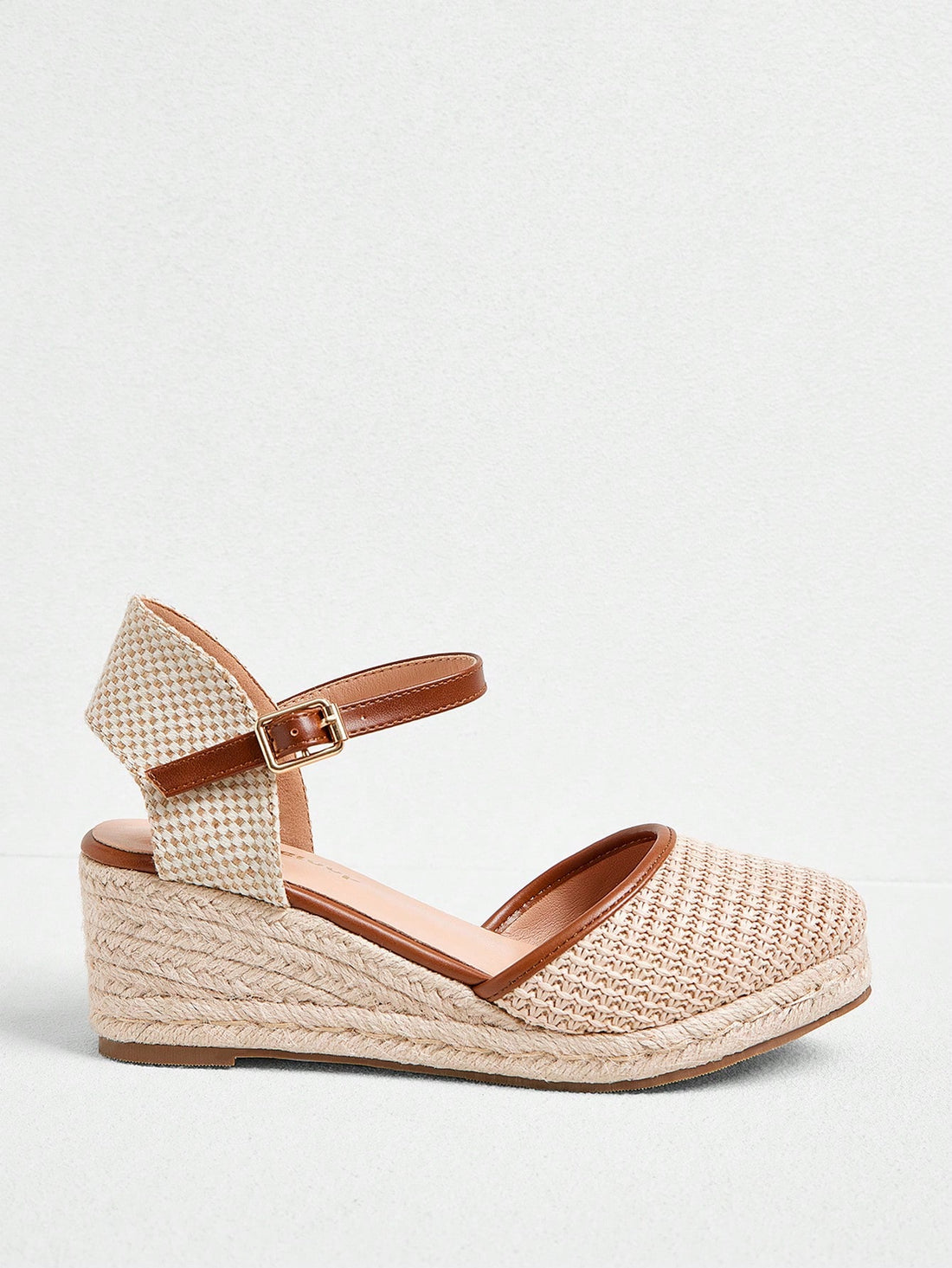 Elevate your style with our versatile wedge slip-ons. With a chic ankle strap and solid design, these shoes are perfect for any season. Stay trendy and comfy no matter the weather! (Go ahead, rock these all year round!)