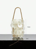 Cream shell paillette handbag with satin liner and gold rope closure