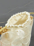 Interior view of white mini drawstring shell bag with pouch lining