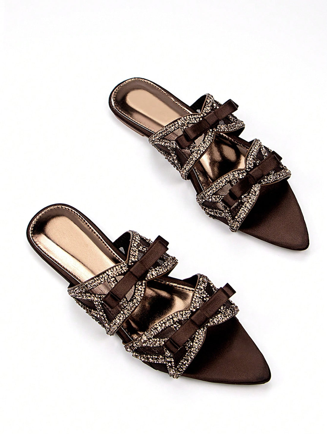 Step into effortless chic with our Crystal Butterfly Mules! These playful brown suede slip-ons feature dazzling crystal butterfly embellishments that catch the light with every step. Perfect for jazzing up your daily outfits or adding a touch of whimsy to party ensembles. Comfy enough for all-day adventures, yet stylish enough to turn heads—these mules are the fun fashion sidekick your wardrobe's been missing!