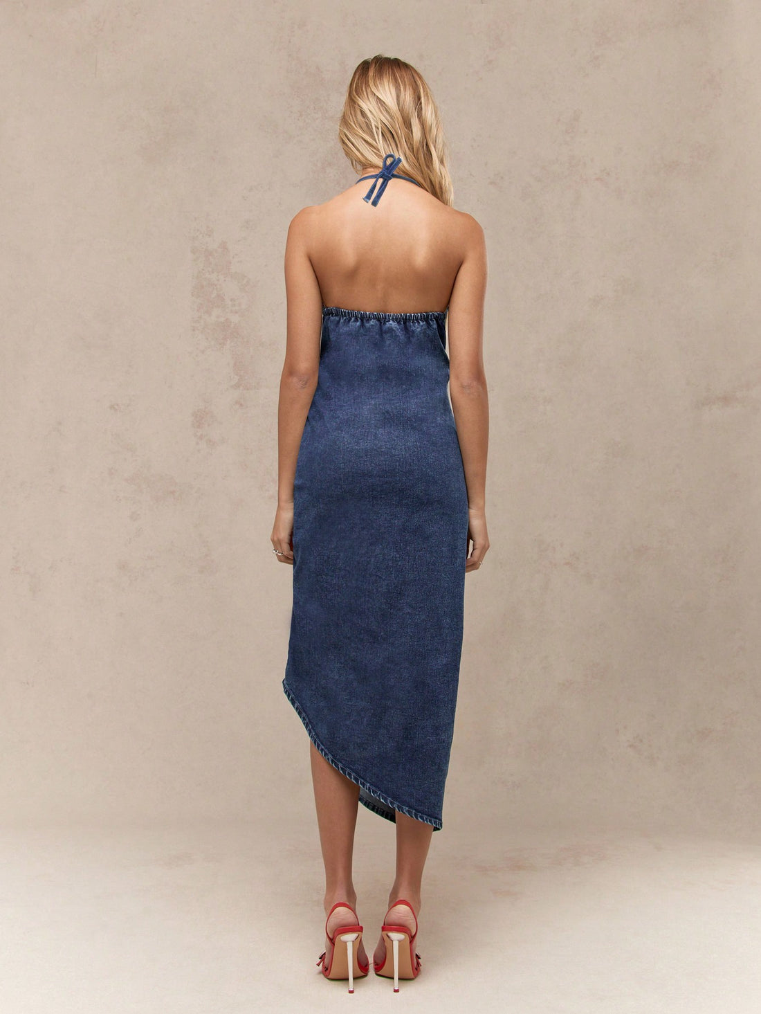 Effortlessly slay in this Chic Ruched Denim Midi Dress, complete with Spaghetti Straps and an Asymmetric Hem for a stylish twist. Perfect for any occasion, this dress will give you the effortless style you crave. (Get ready to turn heads!)