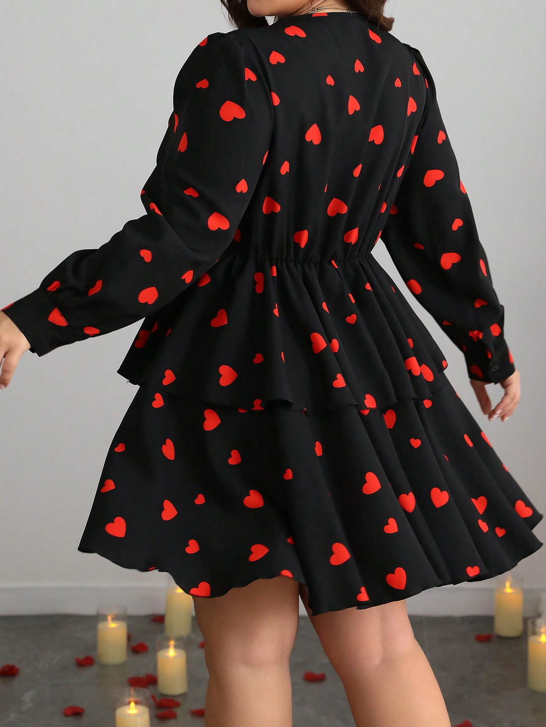 Get ready to steal hearts in this chic plus size dress with layered heart accents – perfect for Valentine's Day or any day! Show off your curves in this flattering and stylish dress that is sure to turn heads. Spread love and confidence with this must-have addition to your wardrobe!