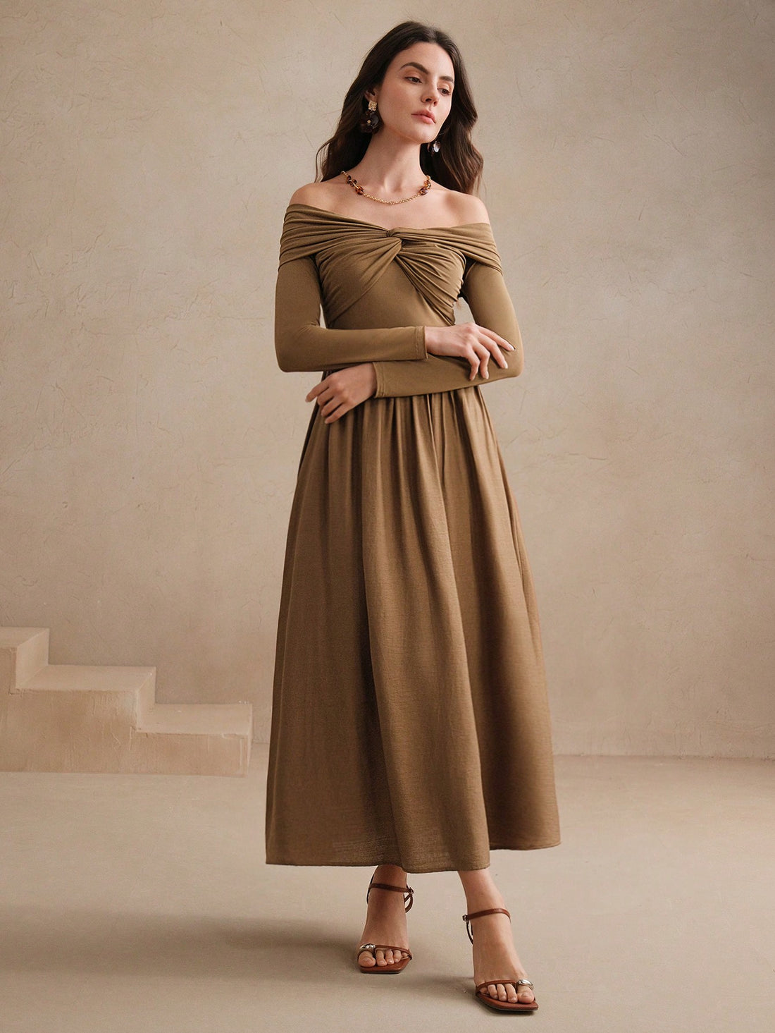 Unleash your pure desire for fashion with our stunning off-shoulder knitted maxi dress. This chic and slimming style will have you turning heads and feeling confident. Say goodbye to boring dresses and hello to effortless style!