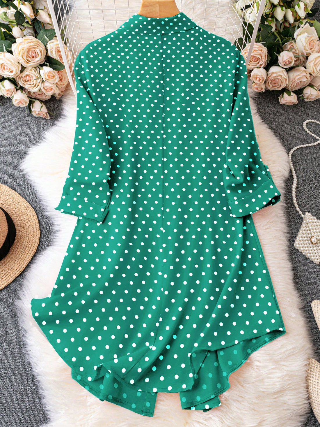 Look chic and be comfortable this autumn in our playful polka dot shirt dress. With ruffle sleeves and a flattering plus-size fit, this dress is perfect for any occasion. Stay stylish and enjoy the season with this must-have piece.