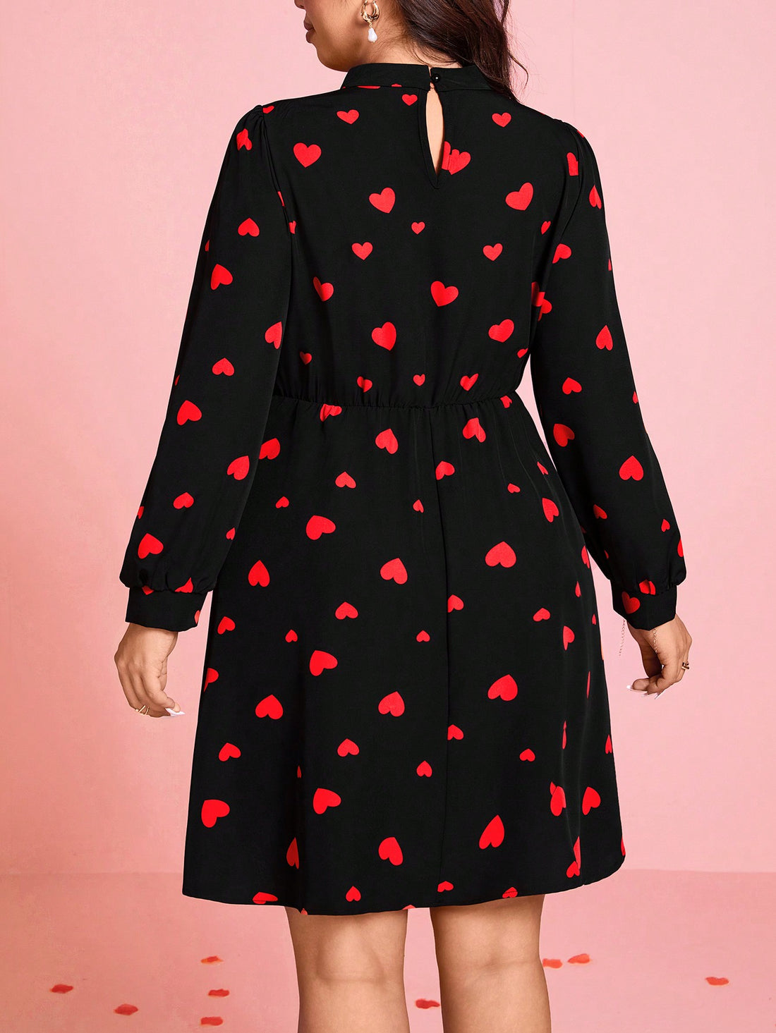 Capture hearts with this romantic dress for Valentine's Day! The charming plus size heart pattern and hollow-out design will make you feel gorgeously alluring. Perfect for a romantic date night, this dress will surely make you stand out. (Plus, it's flattering for all body types!)