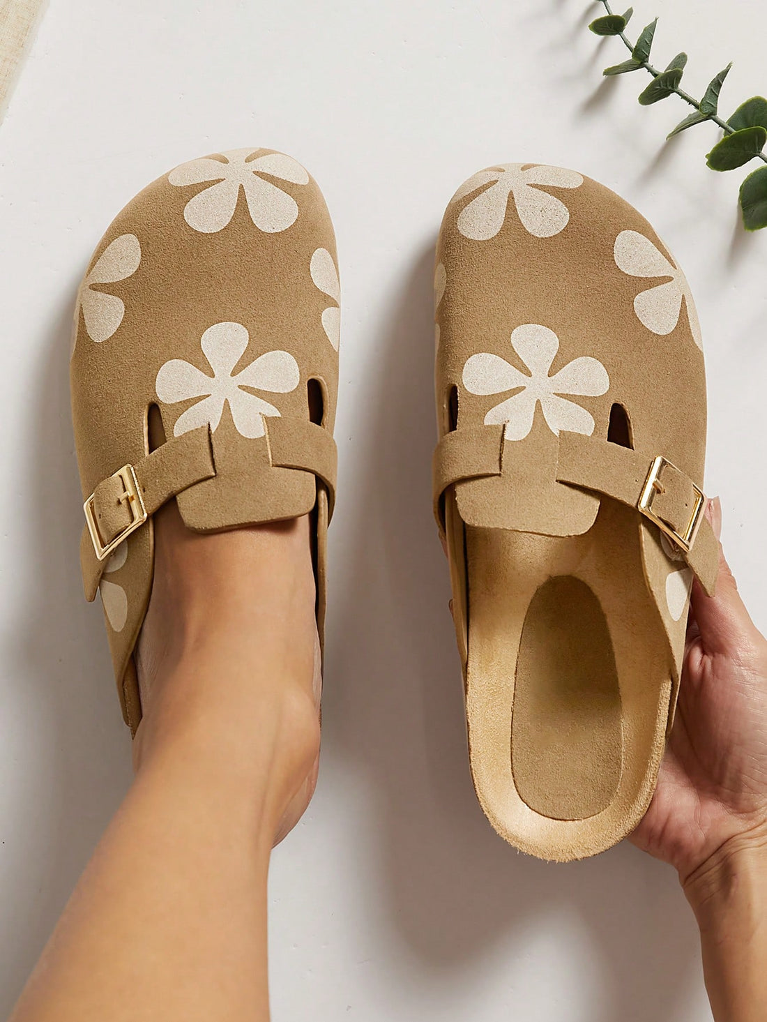 Unleash your inner flower power with Blooming Comfort's Floral Print Slip-On Taupe Mules. These stylish shoes are perfect for summer strolls and make a charming Valentine's gift. Slip into comfort and style with these blooming beauties.